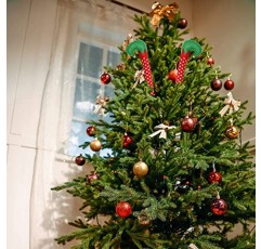 선물 부티크 크리스마스 엘프 다리는 징글 벨이 달린 엘프 신발 스틱으로 봉제 인형 발을 선택합니다. 빨강, 녹색 및 흰색 색상의 나무 장식 장식 6개 세트